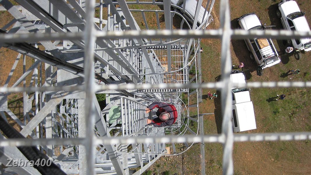 04-Ian shows us how easy it is to climb the Fire Tower.JPG